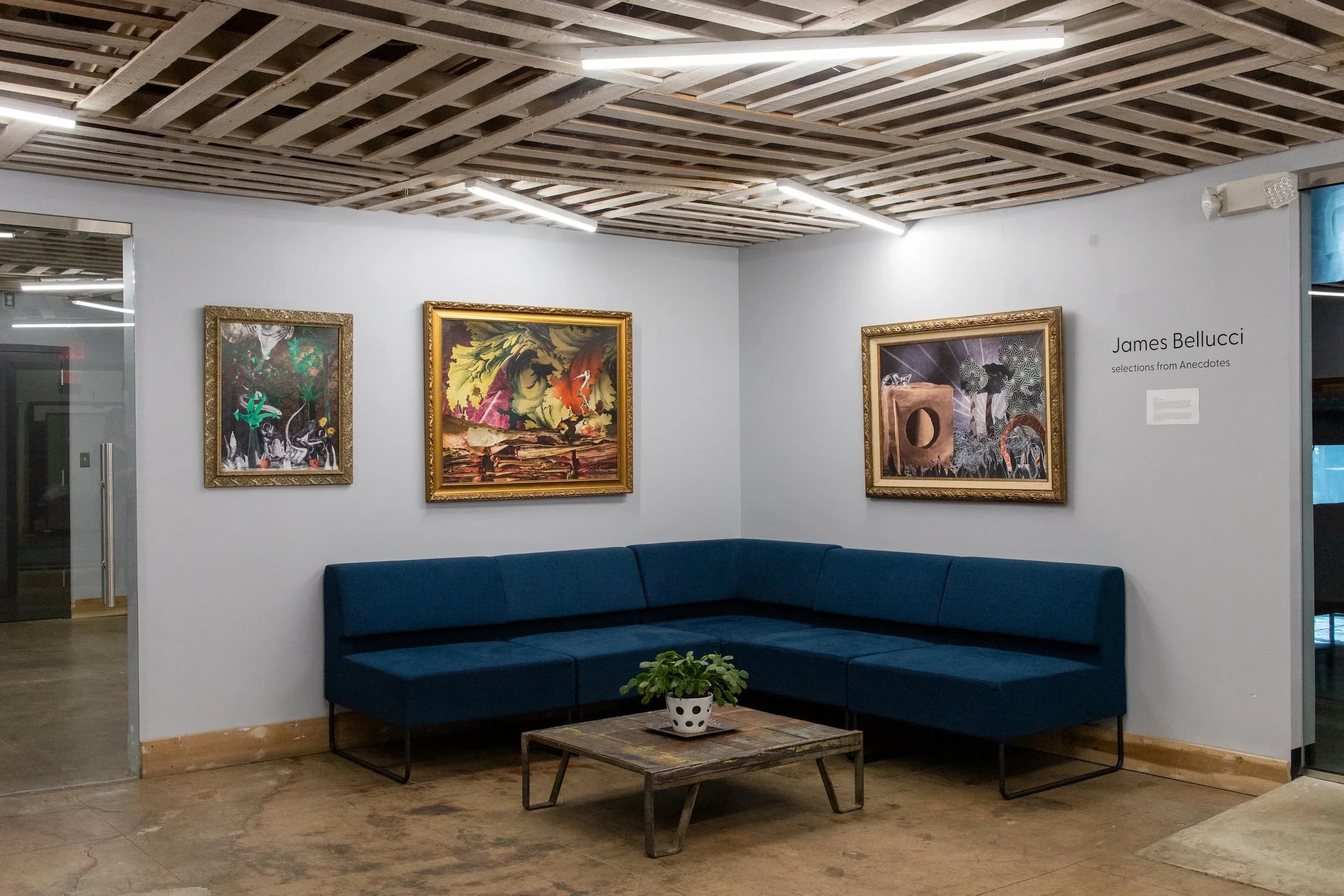 Gallery and lounge area at The Garden with local art and comfortable gathering space.